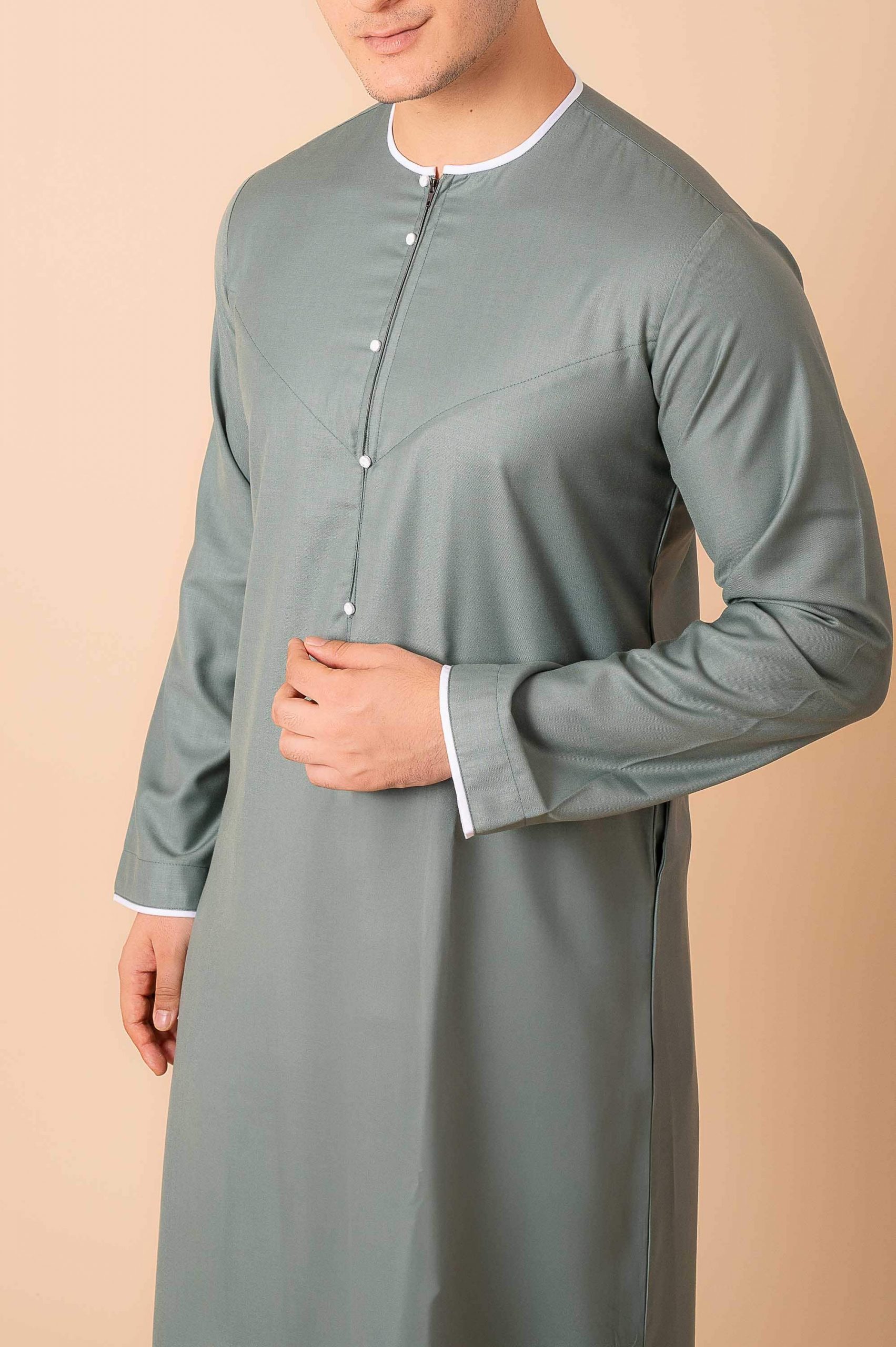 Premium Sage Green Emirati Thobe for Men with White Contrast Piping & Modern Panel Cut - Image 9 - Ruby Online