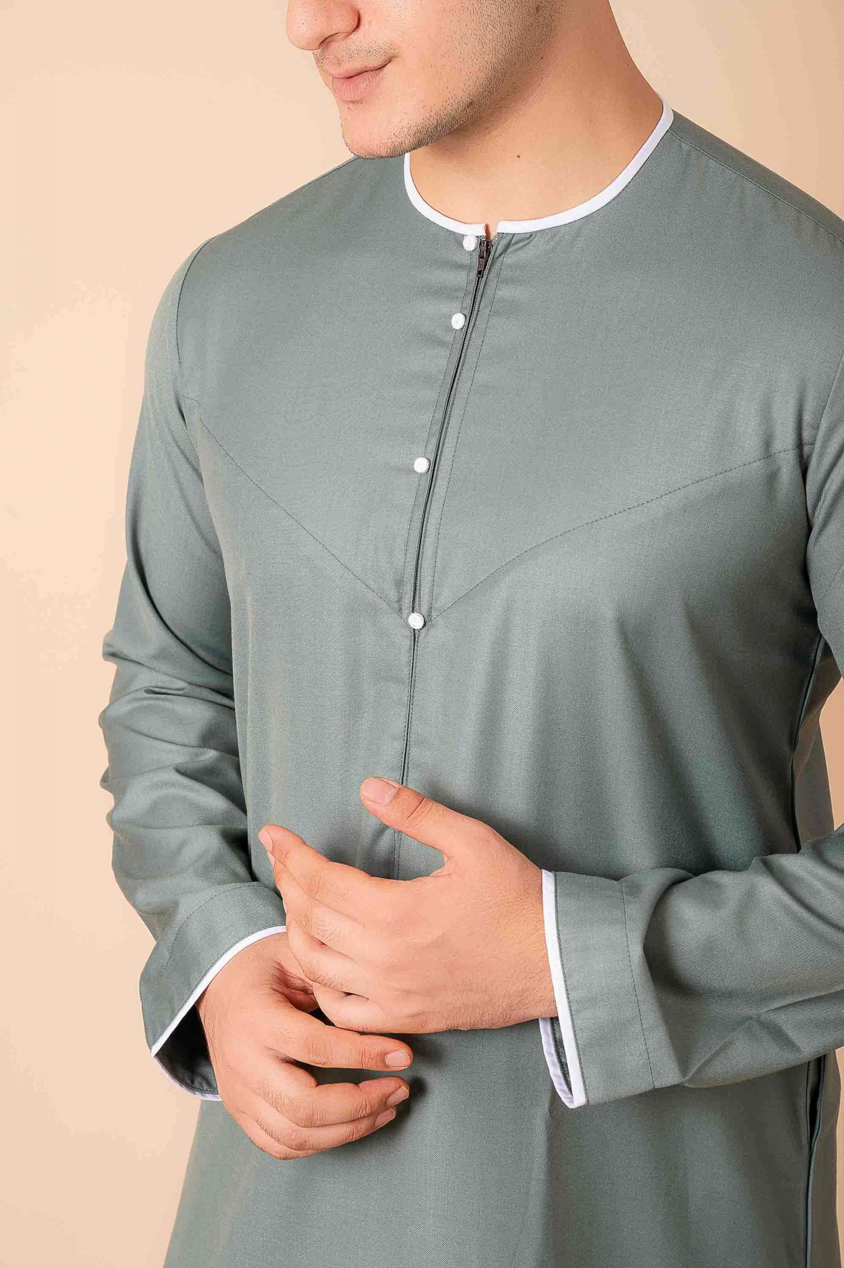 Premium Sage Green Emirati Thobe for Men with White Contrast Piping & Modern Panel Cut - Image 10 - Ruby Online