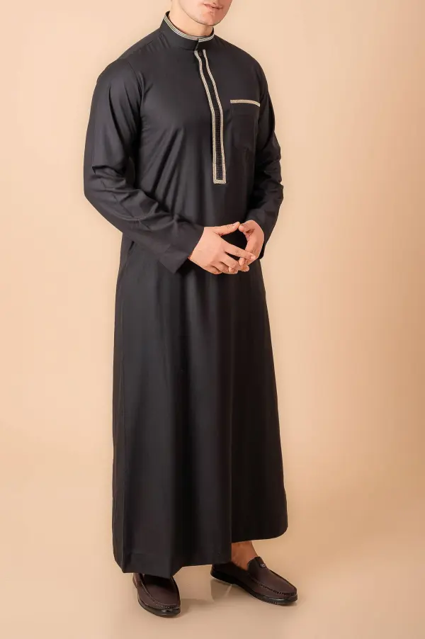 Jet Black Men’s Thobe with Gold Contrast Placket & Pocket Trim - Image 3 - Ruby Online
