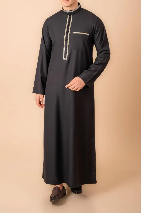 Jet Black Men’s Thobe with Gold Contrast Placket & Pocket Trim - Image 2 - Ruby Online
